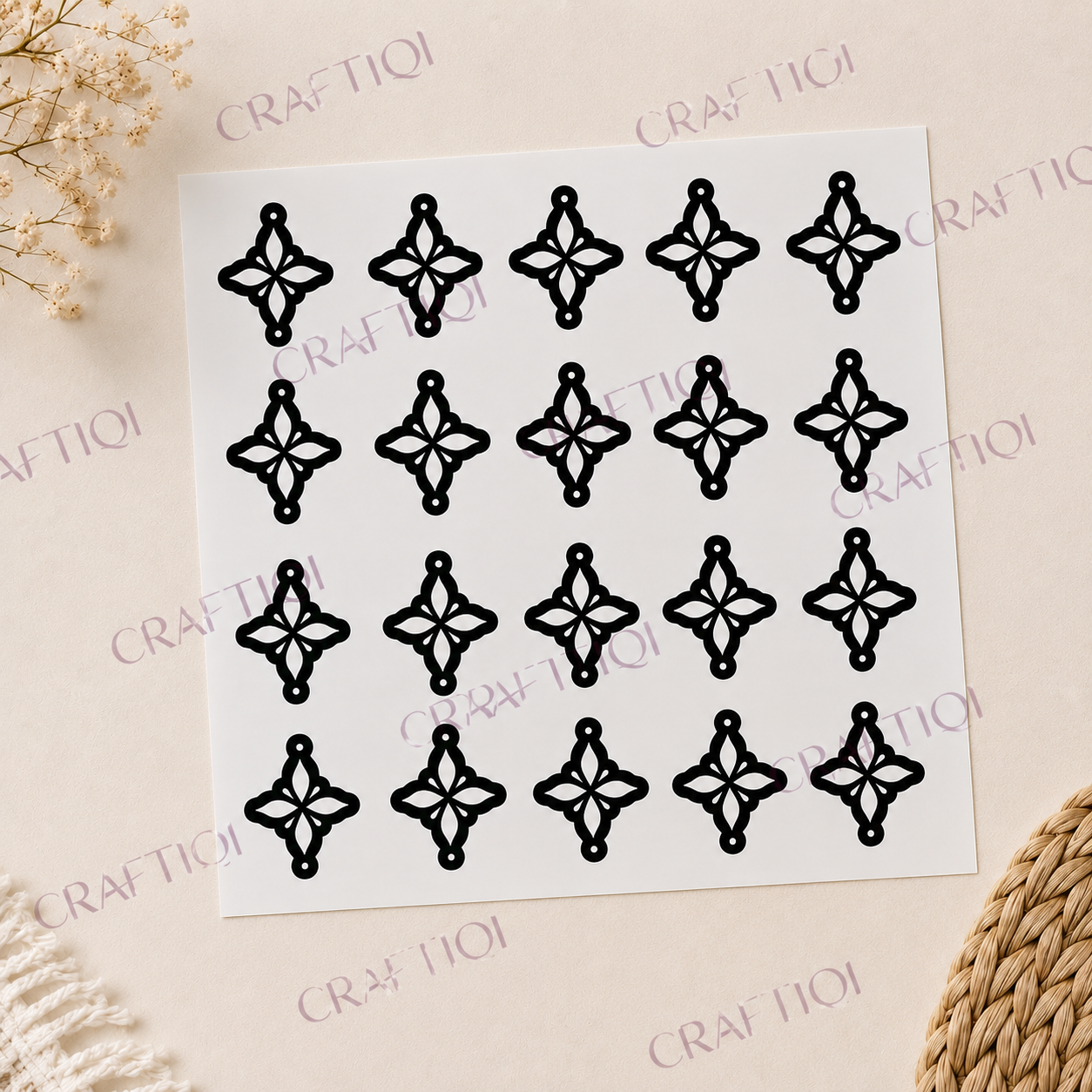 small floral henna stencils arranged on a white backing with Craftiqi watermark a