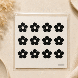 Black floral temporary henna tattoo sheet with small flower designs